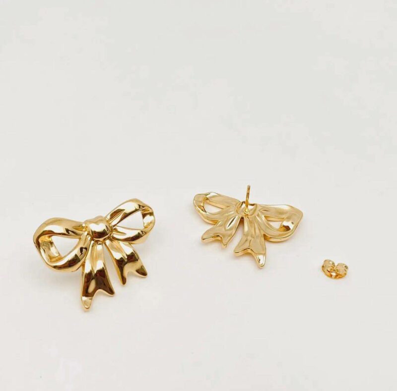Orecchini fiocco color oro - immagine 2